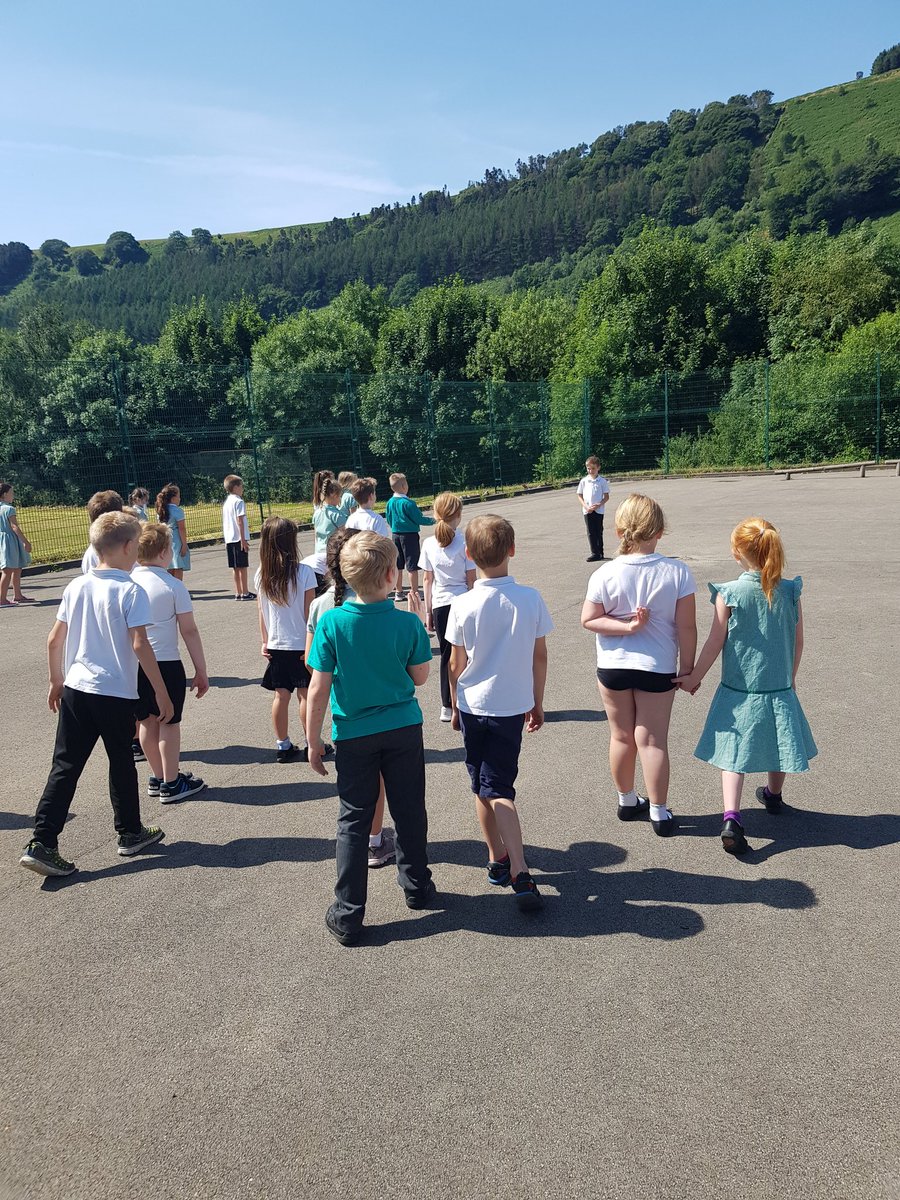 YEAR3_RRC's tweet photo. Taking our Maths lesson outside this week to practise time. Hula hoop clocks and What's the time Mr Wolf? Great work year 3! #outdoorlearning #physicalmaths #time #numeracy #engagedlearners https://t.co/I6THkL66jY