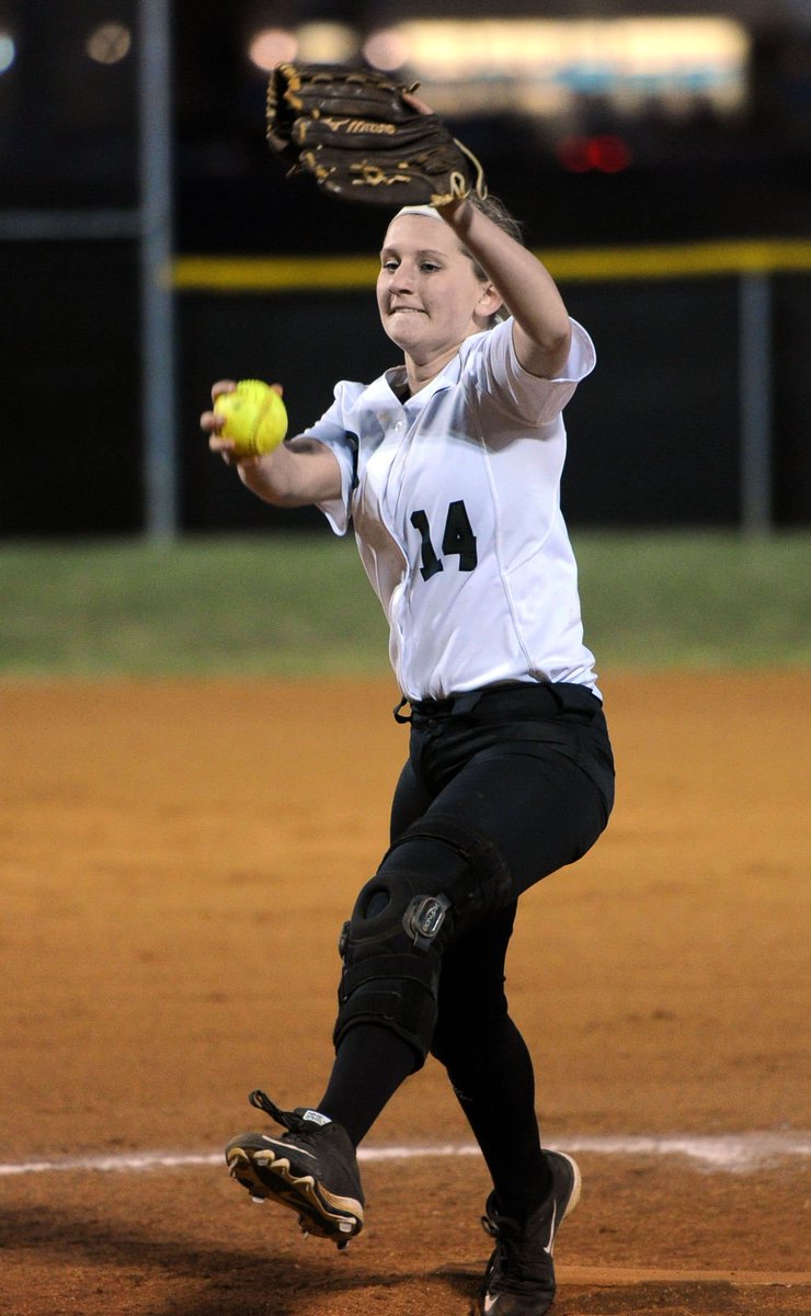 Softball battles for machine pitch Softball battles for machine pitch