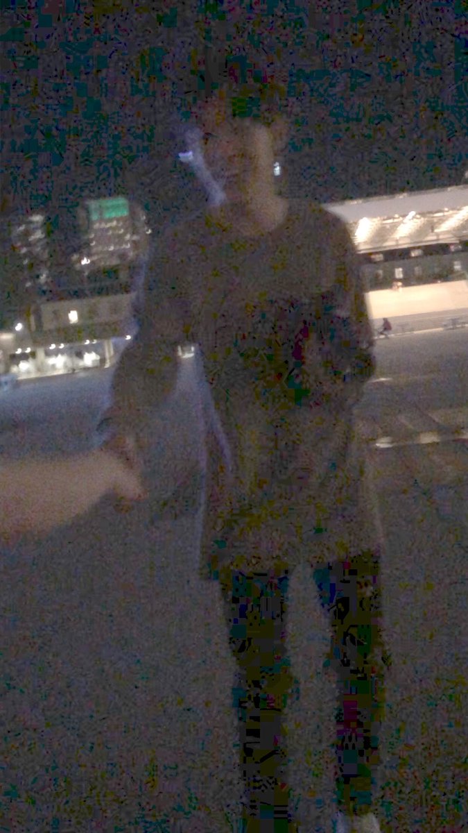 I boosted the exposure since it was midnight but......here he his....holding our hands.....and holding his camera AMAZING