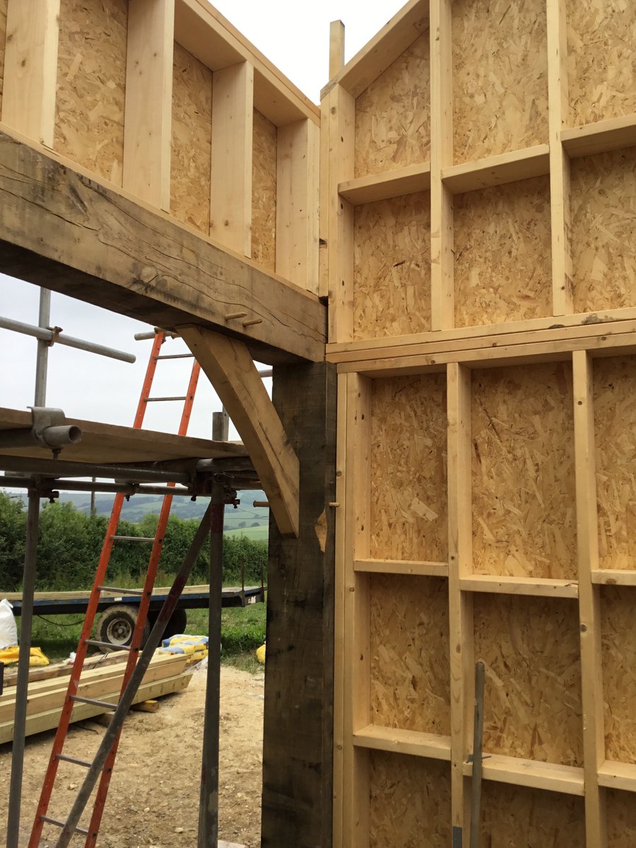 Townsend_Timber's tweet photo. Current hybrid stick frame/oak frame 3 bay, storey and a half barn in West Dorset. Rural location with fantastic views back to Dorchester. Our team are enjoying the tranquility of this peaceful site #townsendtimber #dorsetoakframing #dorsethour https://t.co/RCHznKO9xn