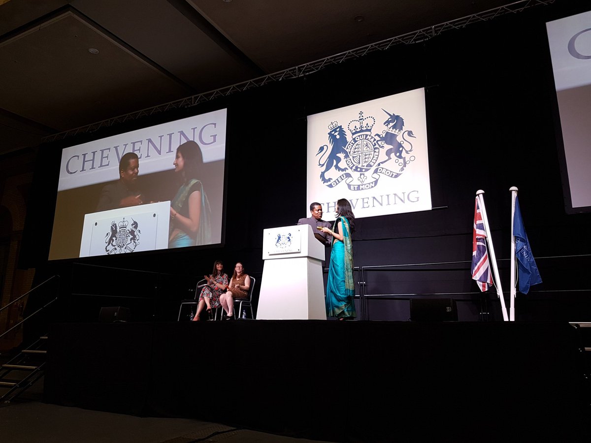 CheveningFCDO's tweet photo. Chevening Alumnus and Saint Kitts and Nevis High Commissioner to the UK @drkmisaac reads the winning poem in this year's Poet Laureate competition. Congratulations to the winner @Dexilirium! #CheveningMemories https://t.co/fLPjZeNvaL