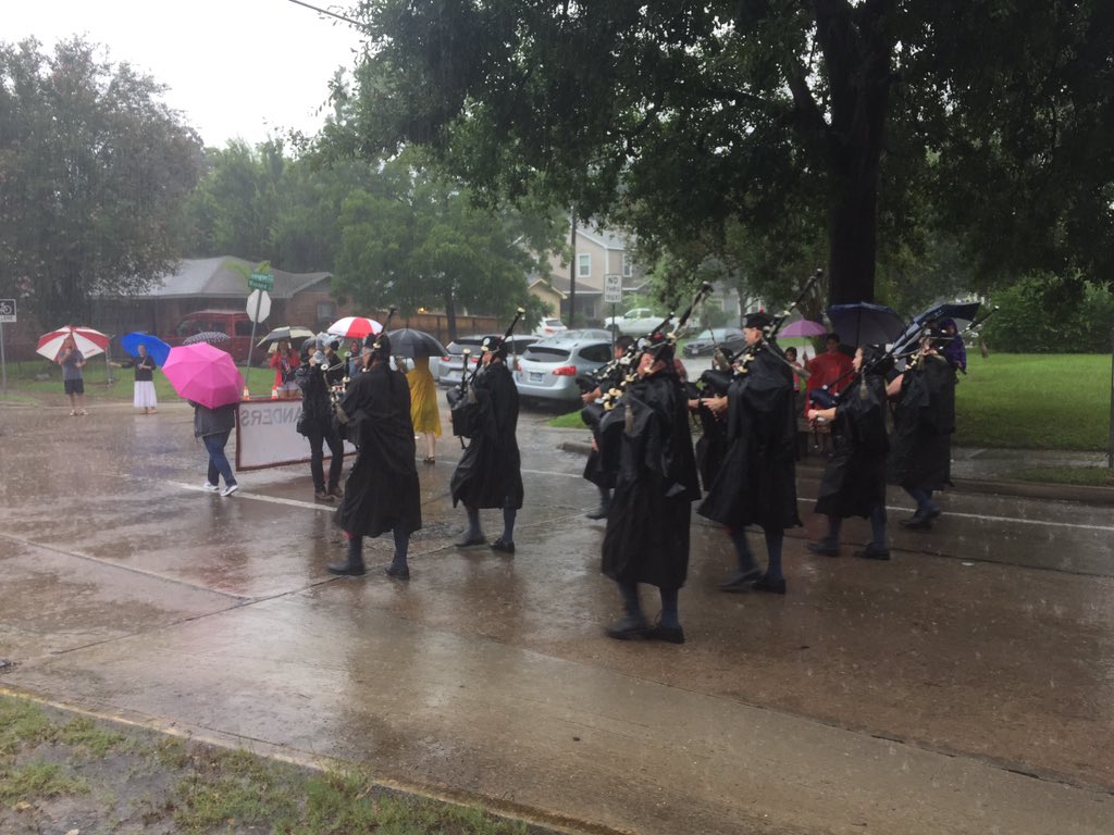 zachdespart's tweet photo. God bless the people of #LindalePark #Houston. Absolutely pouring rain, ankle deep in places, and they still hold their #FourthofJuly  parade for a delighted/soggy crowd. #TX https://t.co/EdSDAi0s1K