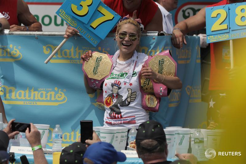 Competitive eater Miki Sudo, after eating 37 hot dogs, wins the Nathan's Hot Dog Eating Contest in Brooklyn, New York City