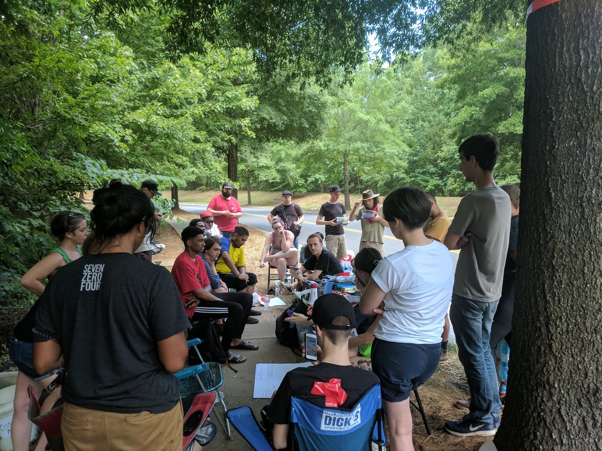 pitkin_ryan's tweet photo. Out at the local Dept. of Homeland Security office where folks have been occupying the sidewalk outside since Sunday evening in a fight to #AbolishICE https://t.co/ou5rCYcTZ1