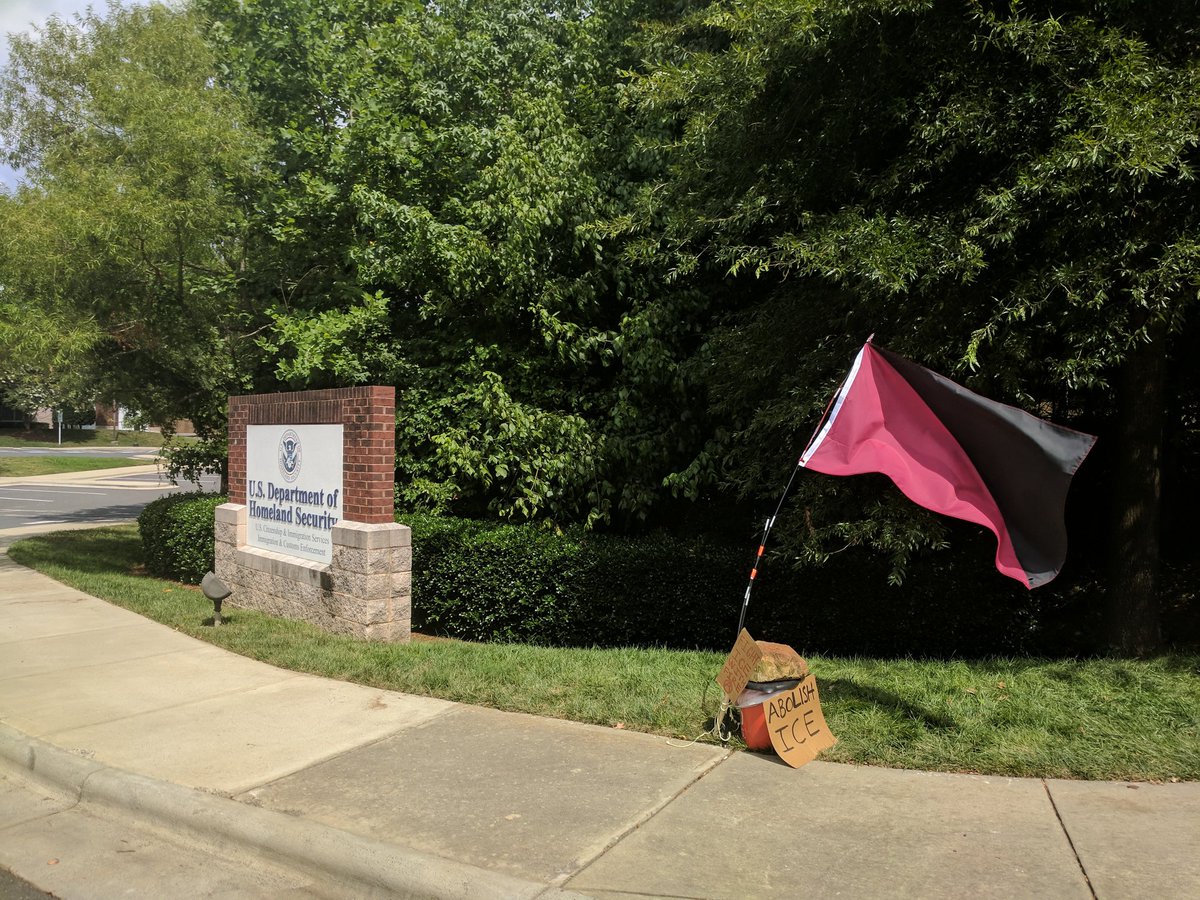 pitkin_ryan's tweet photo. Out at the local Dept. of Homeland Security office where folks have been occupying the sidewalk outside since Sunday evening in a fight to #AbolishICE https://t.co/ou5rCYcTZ1