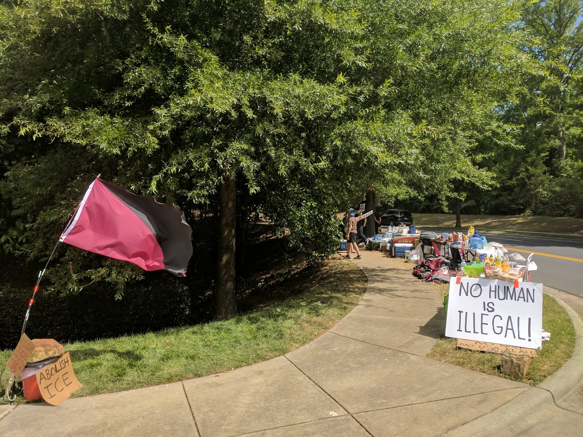 pitkin_ryan's tweet photo. Out at the local Dept. of Homeland Security office where folks have been occupying the sidewalk outside since Sunday evening in a fight to #AbolishICE https://t.co/ou5rCYcTZ1