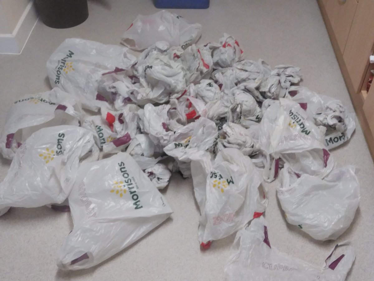 Notsoheavyhero's tweet photo. We've had four deliveries from @Morrisons but the bag situation is ridiculous, a whole carrier bag for 2 books of stamps? There are 60 bags here, surely there must be a better way? https://t.co/gVjTncc2ey