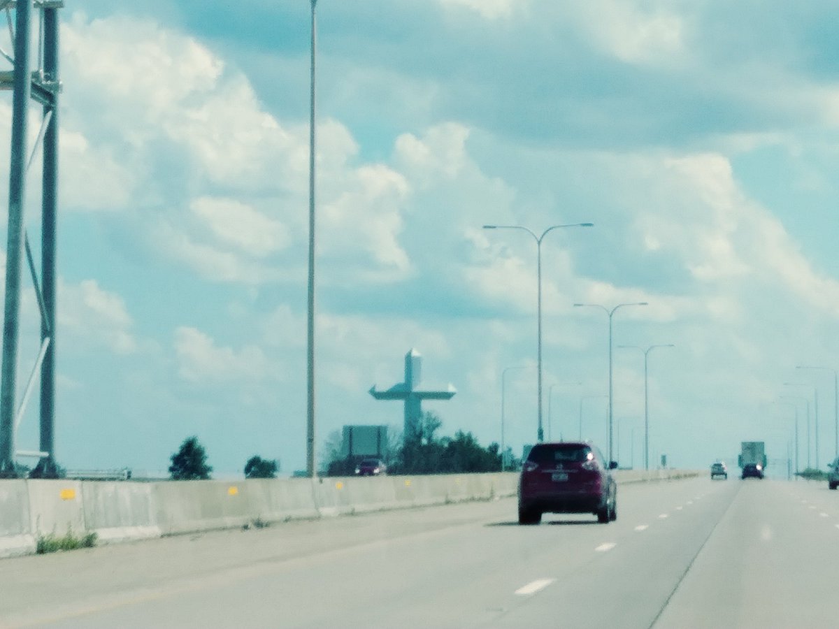 jlmccafferty1's tweet photo. We keep passing these insanely large crosses at the side of the road and I can't help but draw the comparison to guys who take their mufflers off to roar their engines louder. We aren't even to the South yet. #JenAdventures https://t.co/BGR1Fbcnd2