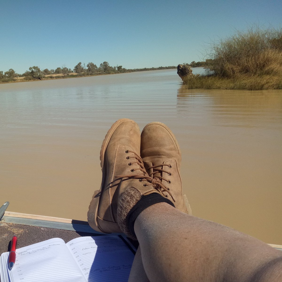 MsLisaHerbert's tweet photo. Today's office on the Diamantina River, recording an interview with @cathyborder. I swallowed a fly mid-interview. Being a consummate professional I spluttered and hacked like someone who'd just swallowed a fly.
(BTW, four months ago it was dry here.)
#flyeater
#Birdsville https://t.co/9EmeeWsdCC