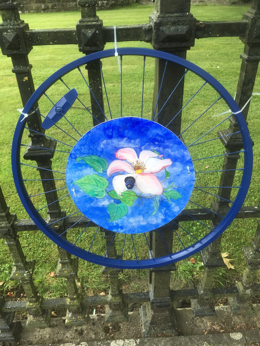 UskTownCouncil's tweet photo. More of the wonderful bike wheel art displayed on The Sessions House & Owain Glyndwr Field railings again well done to everyone who produced a wheel we are blown away by the level of artistic skill from Usk and area residents - simply amazing. #cycleusk #velothon #velothonwales https://t.co/rxU7TBE172