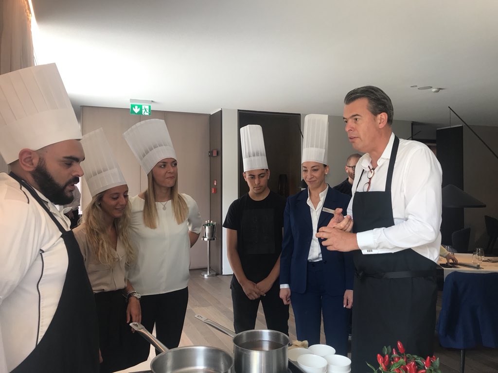paolonardi80's tweet photo. Today for their Global Week of Service #Hilton EMEA Executives will cook #risotto with our students from @AmiciDiCometa and @IATH_Cernobbio | #innovation #BizEdu partnership #InclusiveExcellence https://t.co/6eRKiO4Za9