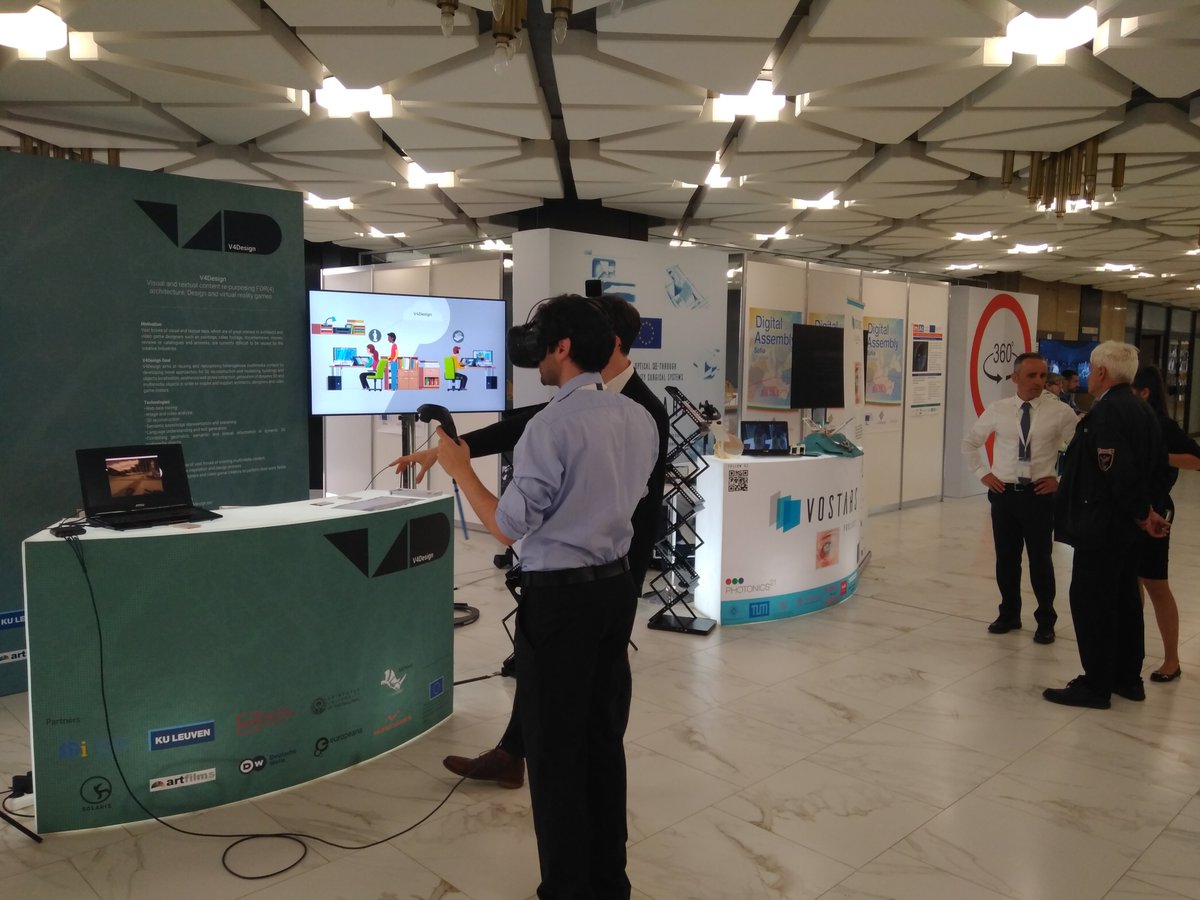 V4DesignProject's tweet photo. Last week, V4Design participated in Digital Assembly 2018 with an exhibition stand offering to visitors an exciting virtual reality walk in a historic square, the Berlin Gendarmenmarkt, during different time periods! #DA18eu #V4Design #demo #VR #game_design #relivethepast https://t.co/ORsQumiaM7