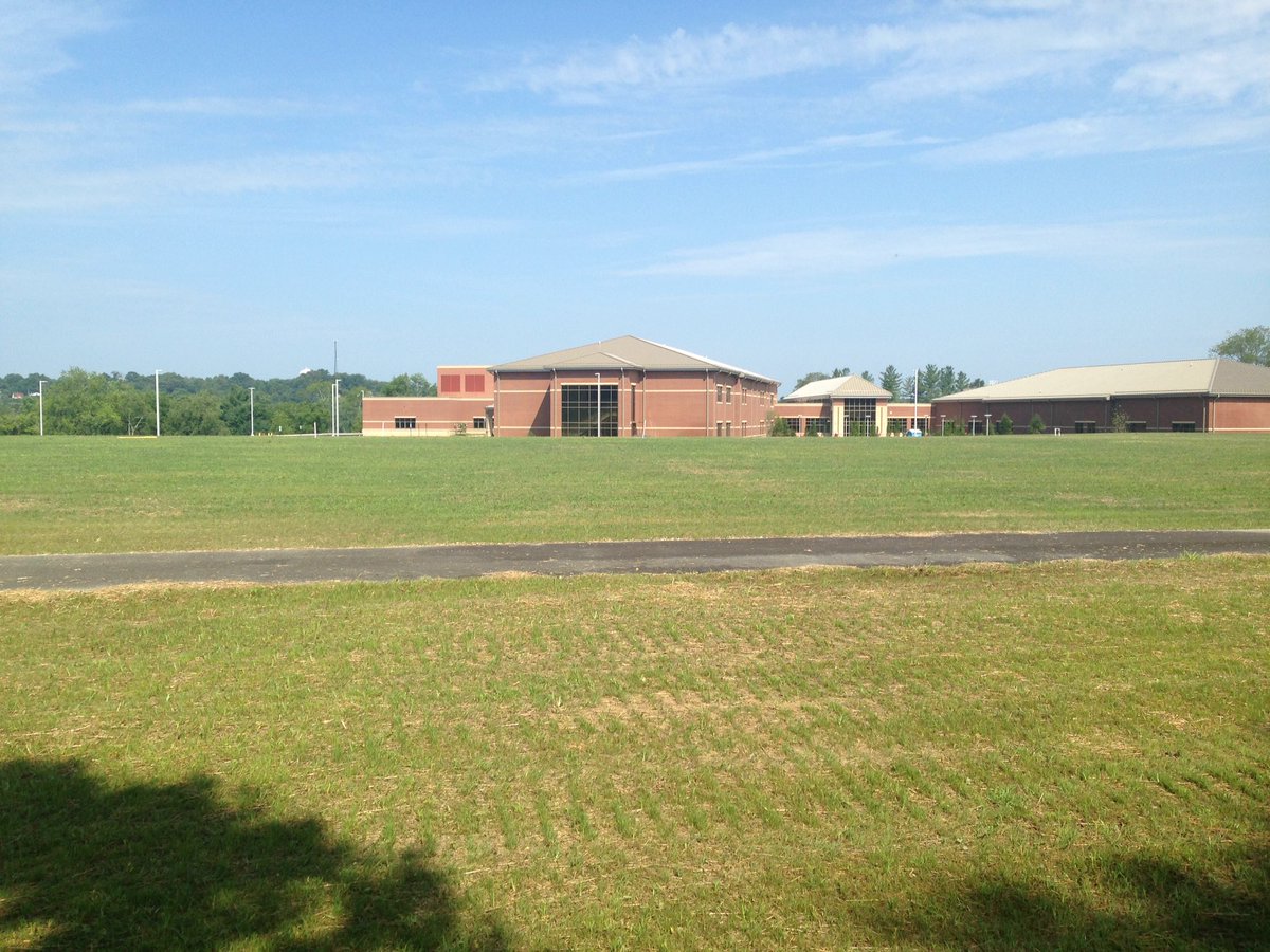 CoachJackson05's tweet photo. Excited to see the new middle school almost finished. Pumped about a new and improved practice facility.  Got a little more work to do before we can get on it but it won't be long.  Go Redhounds! https://t.co/u9PcyplNGx