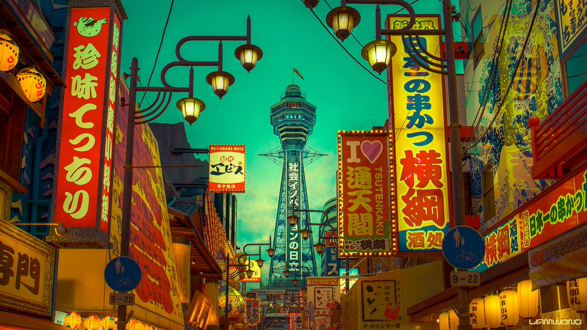 A shot of OSAKA tower, with hues of blues, teals and orange. At the center is the large tower, on either side is Japanese signage.