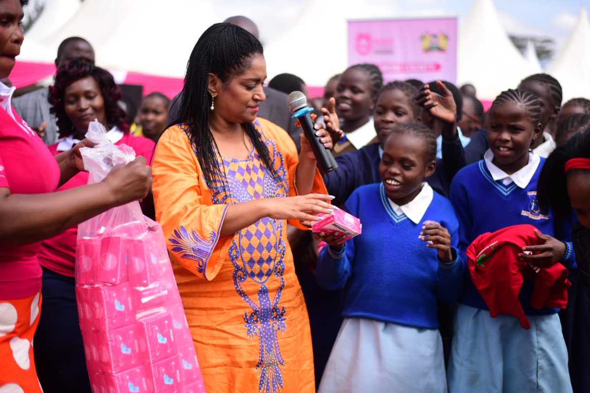 Image result for Passaris distributing pads to schools