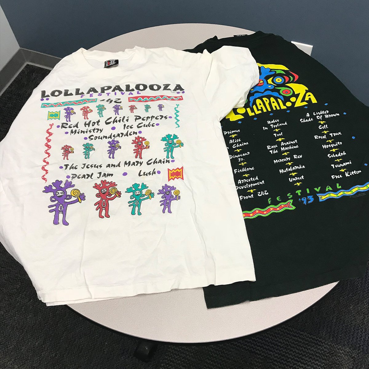 MerchlyMerch's tweet photo. Get a glimpse of these retro Lollapalooza concert tees from '92 & '93. Michelle, our resident SEO whiz, attended Lolla in Stanhope, NJ back when it was a touring festival and still has the merch to prove it! #MerchMakesMemories #ThrowbackThursday https://t.co/exjO0u353J