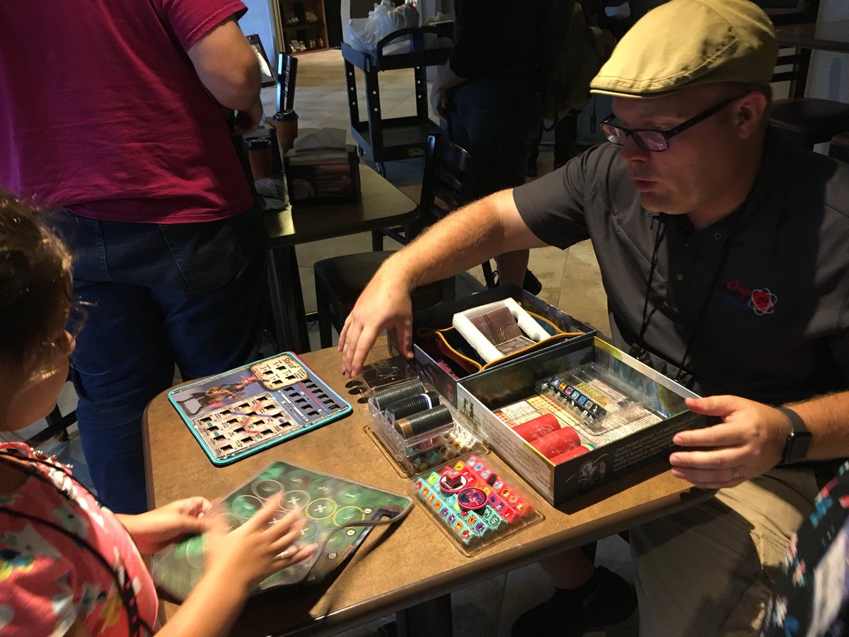 StrieEyes's tweet photo. Emmy met her idol today! Easily one of the nicest people in boardgaming, or anywhere! Thank you Mr Adam Carlson, you are one classy gentleman!! #chiptheorygames #toomanybones #hoplomachus #triplock #DiceTowerCon #boardgames #tabletopgames https://t.co/R9qfbP6BQW
