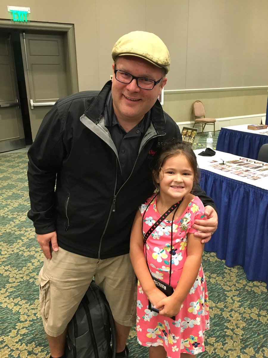 StrieEyes's tweet photo. Emmy met her idol today! Easily one of the nicest people in boardgaming, or anywhere! Thank you Mr Adam Carlson, you are one classy gentleman!! #chiptheorygames #toomanybones #hoplomachus #triplock #DiceTowerCon #boardgames #tabletopgames https://t.co/R9qfbP6BQW