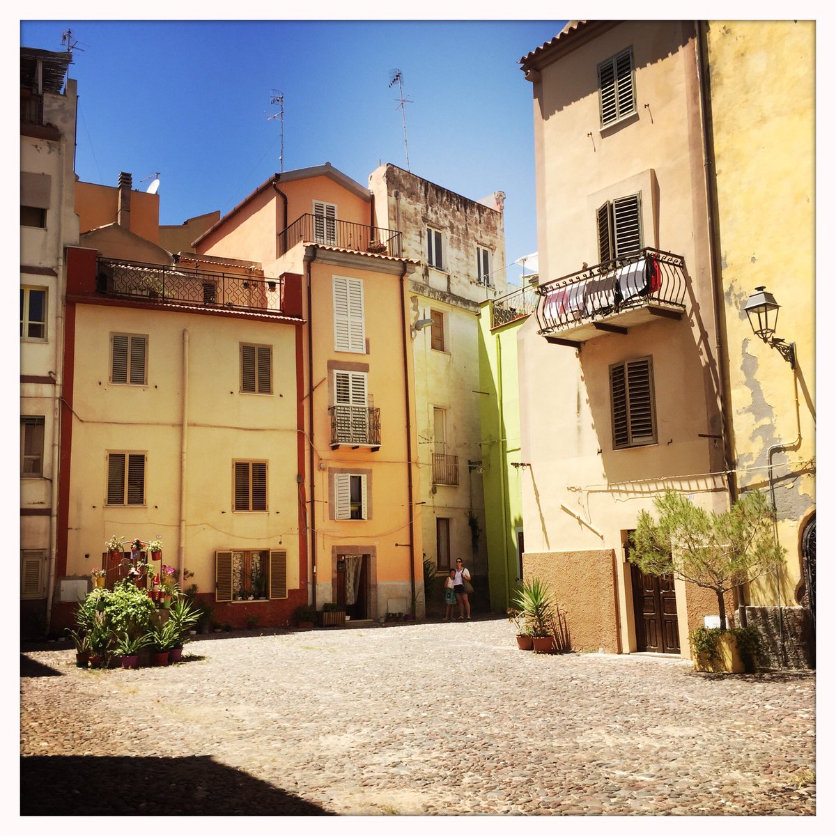 KeathParker's tweet photo. what is it about old decrepit (european) cities that makes them so charming? 
#bosa
#sardegna https://t.co/H2YCuAdeAi