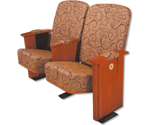 The graceful curved outerback is surfaced with the finest wood veneers. The aisle panels can be our standard designs or solid hardwood decorator panels. Various elegant armrest designs compliment the appearance.