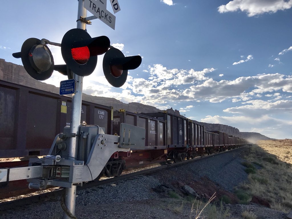 KevinIrvineChi's tweet photo. Was excited to make a nice pic of a train rolling through the gorgeous desert of Moab, Utah. Got less excited when I realized later that it carried radioactive waste. 😕 #DoubleCrossing https://t.co/h0CR75I35h