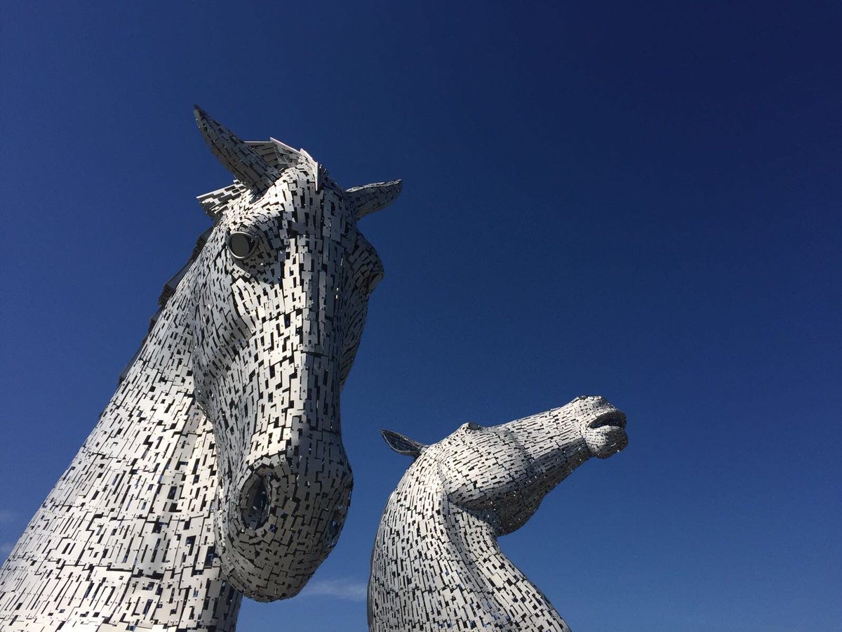 GoCapercaillie's tweet photo. Glorious cloudless back drop for our handsome #Scottish #Kelpies to enjoy - the summer continues and we love it | #heatwave #ScotlandIsNow https://t.co/duAKiTFK4s