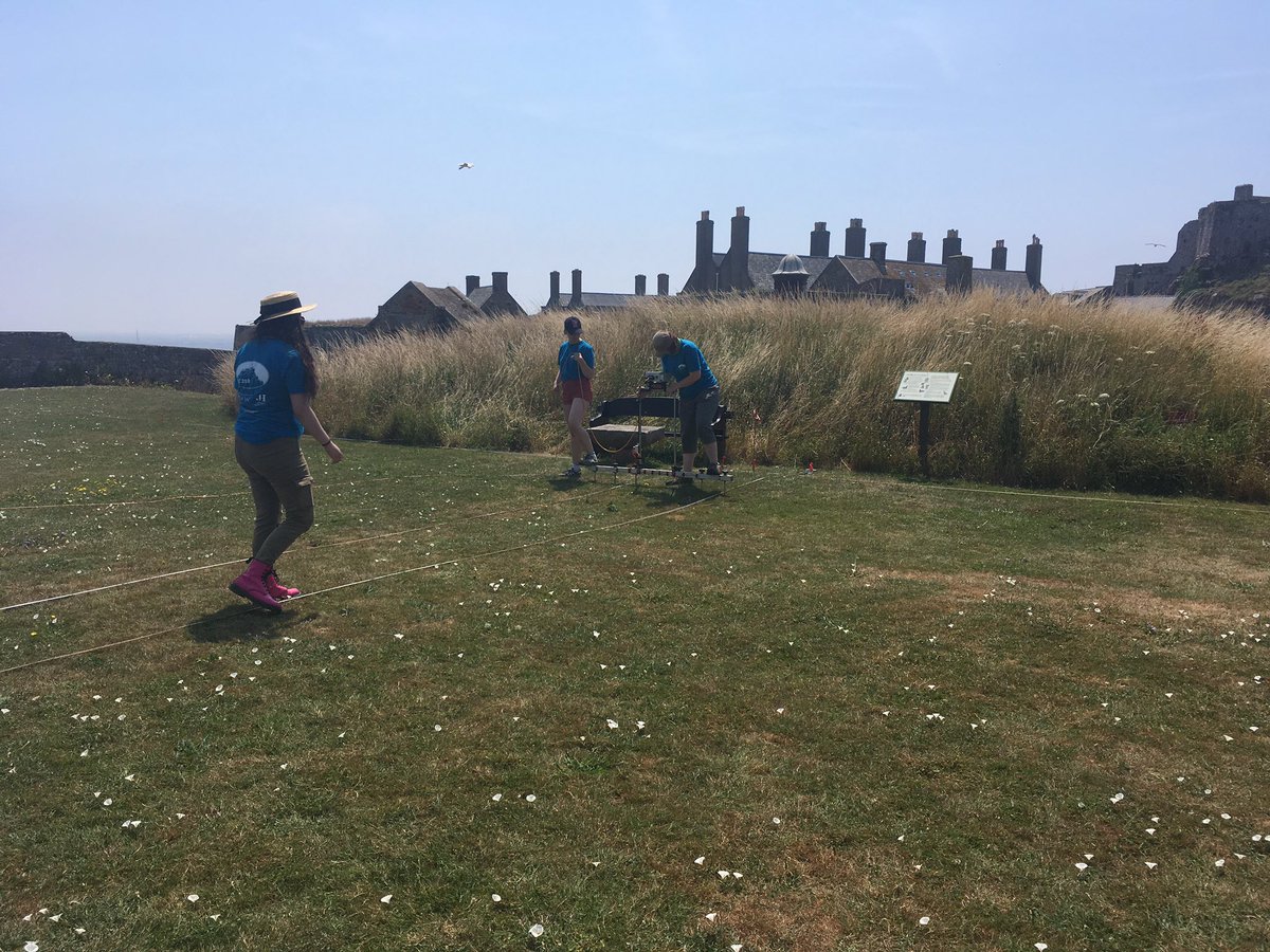 ECJProject's tweet photo. With all the hot weather drying out the ground, our Geophysical Survey team are having to work extra hard onsite! #ecjp2018 @loveheritage #loveyourcastle https://t.co/8ECgbeFfnp