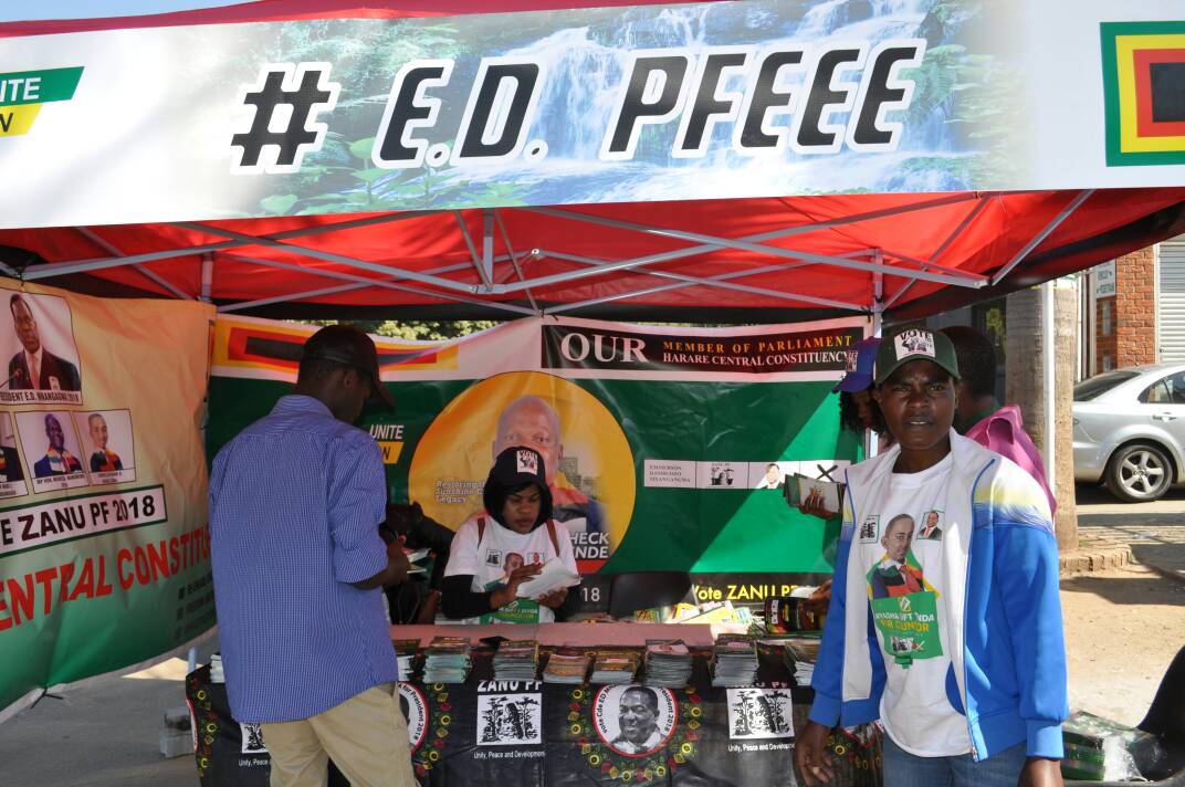 AfricanElect's tweet photo. Zanupf members on one one election campaign in harare https://t.co/paZO9WLgni
