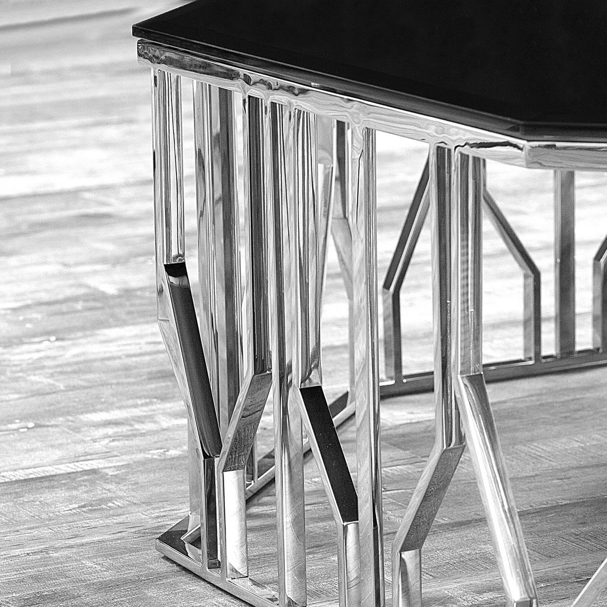 AllaModaDesign's tweet image. Lorensia Luxury Coffee Table features an octagon shape black glass top and silver polished stainless-steel base and comes in two sizes.