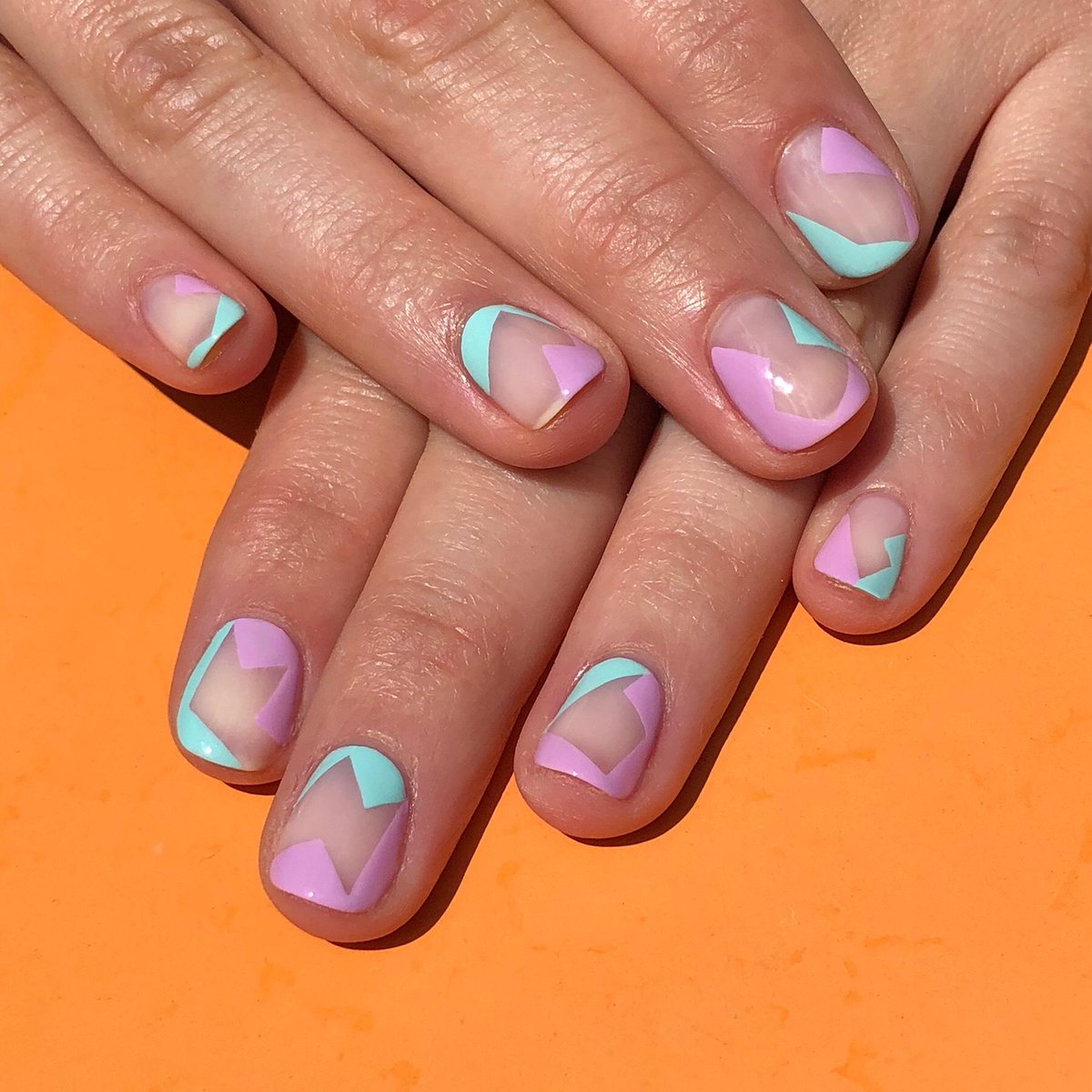 essie's tweet photo. purple and mint, a shade combo that never fails! geometric nail art by @purplenailbox featuring #mintcandyapple and #baguettemenot https://t.co/pb5T5wD4V8