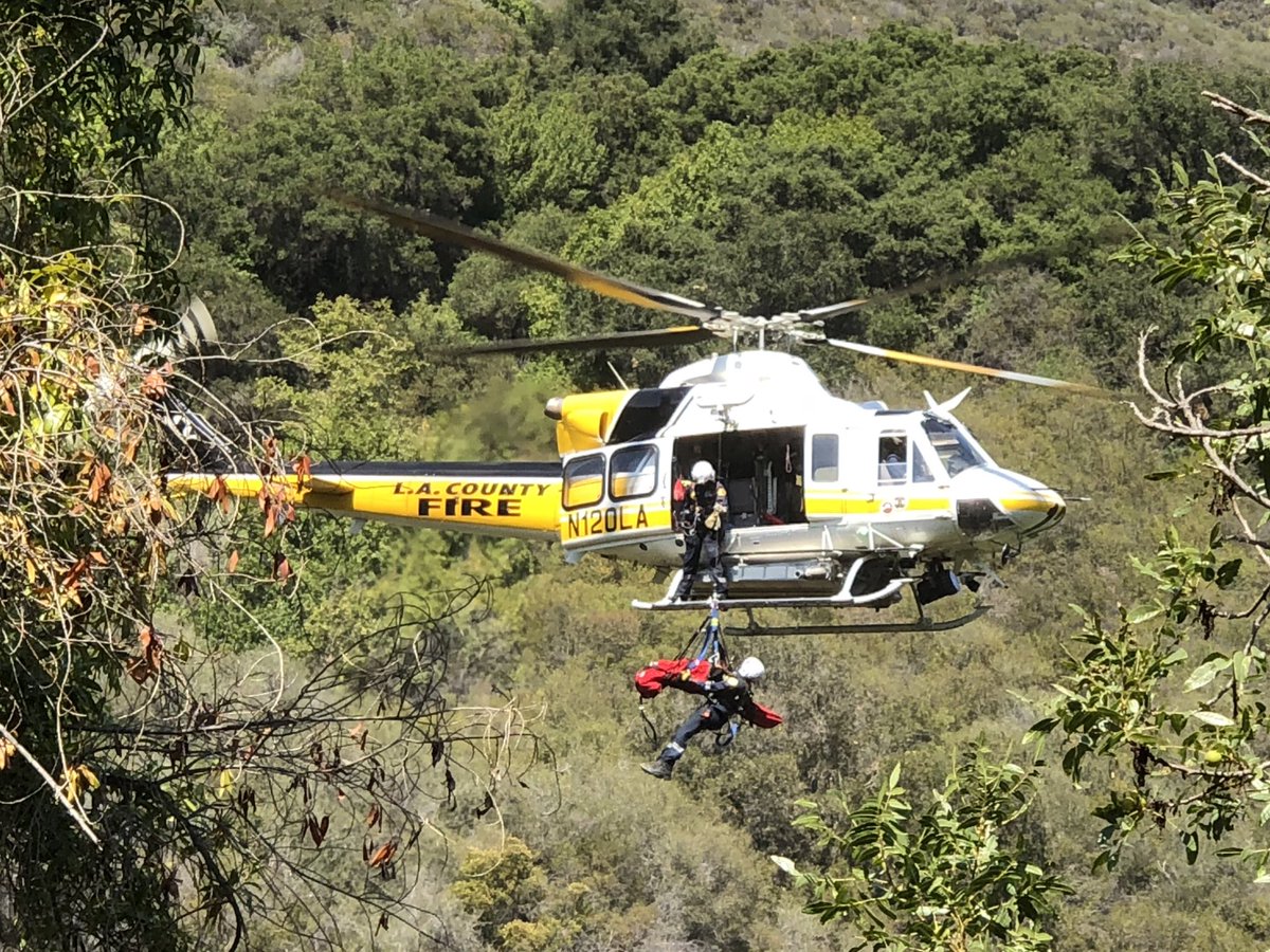 LACoFireAirOps's tweet photo. HOIST RESCUE 7/6/18 COPT12 Paramedic helicopter rescued an injured adult male from a difficult to access area of Topanga Canyon assisting @LACoFD @MalibuSAR @McCormick_EMS @LHSLASD @CHPWestValley (📷@MalibuSAR) https://t.co/pUDcsJHSLf