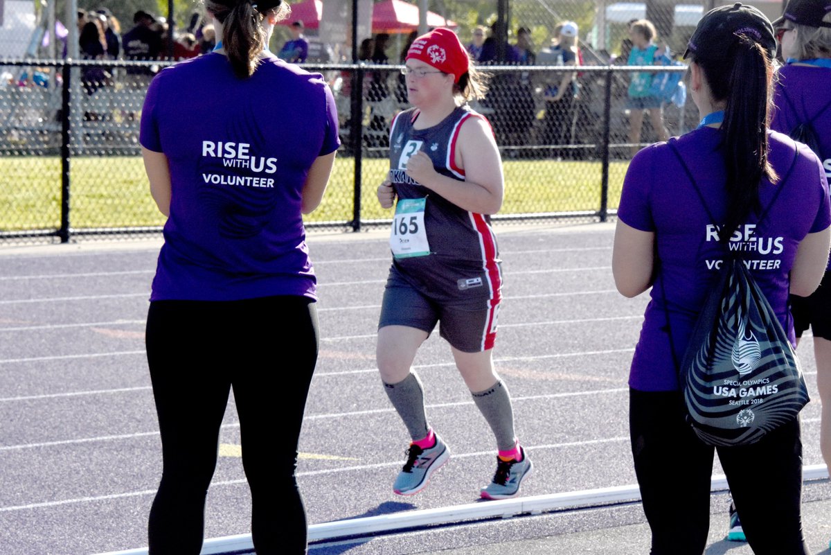Volunteers watch a race