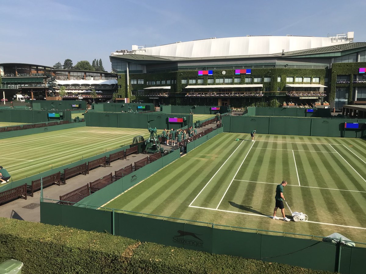 The team all out getting the courts ready for day 6, another lovely sunny day ahead #Wimbledon