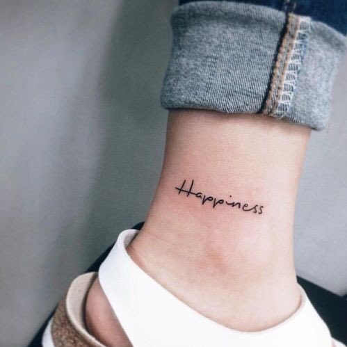 Stay a positive lettering tattoo located on the inner