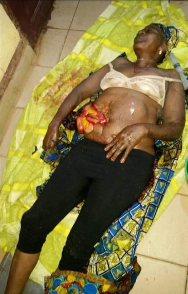 JosephAwali's tweet photo. shot today in Kom Northwest of Cameroon by  terrorist soldiers.  See the picture of the woman when she was alive and today  July 6th 2018 https://t.co/hUTCAFibxP
