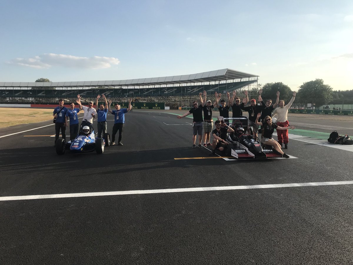 FormulaStudent's tweet image. @UTARacing &amp;amp; @Cardiff_Racing on the Intl. grid at the #BritishGP! #FSdoesBGP #FSUK #FS2018