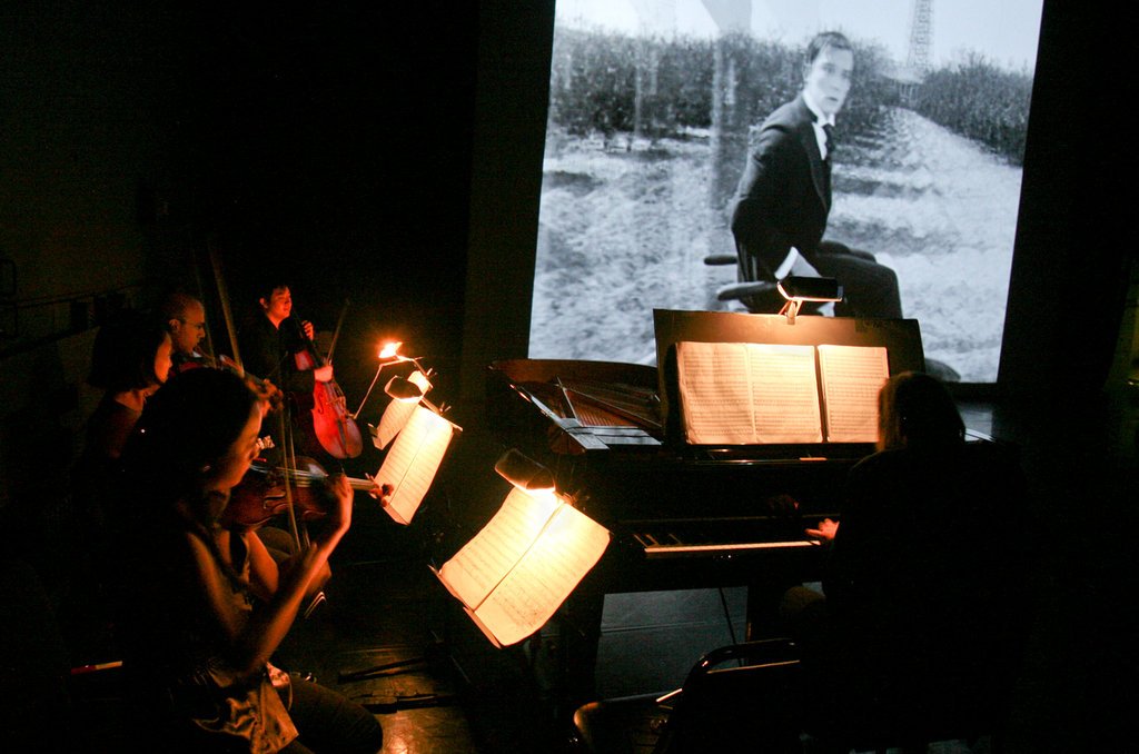 MITMVancouver's tweet photo. Stephen Prutsman is called genius: Composer, jazz artist, and medalist in the Tchaikovsky Competition, we see all in his work SHERLOCK JR accompanying Buster Keaton's film. #SummerMusicVancouver audiences get to see @AfiaraQuartet and Steve reunite again. https://t.co/6Nnrj0Halh https://t.co/b4GX38oWQc