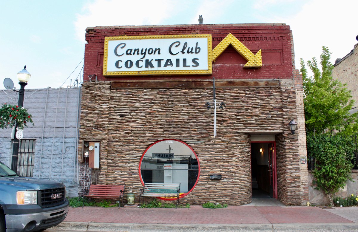 onroadaz's tweet photo. I have to give props to Canyon Club on #NationalDiveBarDay. Both entrances are on #Route66 in Williams, Ariz. Friendly locals, table shuffleboard &amp; ice in the urinals. #SaveTheDiveBar https://t.co/hyMzMfxWmN