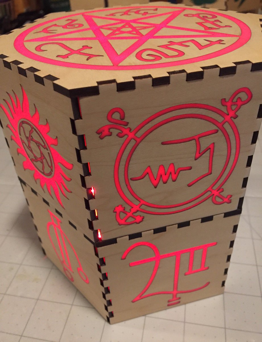 Maple wood lamp with glowing red supernatural symbols