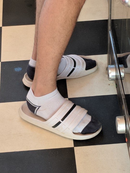 white socks and flip flops