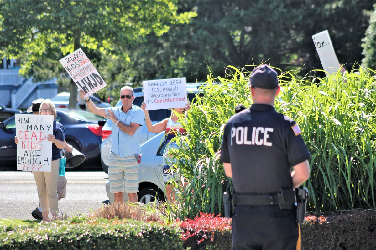 Jerseynews_Bill's tweet photo. Outside the Ocean City Tabernacle. protesters decried the NRA, which this morning's guest speaker Oliver North has been tapped to lead. North spoke at two morning services. https://t.co/gpAHQ9BpKs