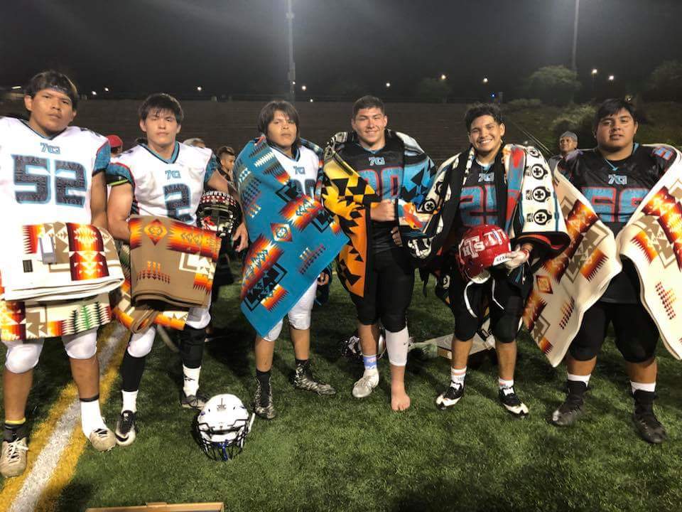 Congratulations to the 2018 Indigenous Bowl MVPs

#52 Brandon Aimsback Browning, MT DMVP
#2 Dylan Loring Browning, MT OMVP
#90 Keland Bearpaw Sapulpa, OK Lineman Award
#90 Blayne Allen Muskogee, OK DMVP
#25 Daniel Salomon Tucson, AZ OMVP
#58 Wayne Garcia Hemet, CA Lineman Award