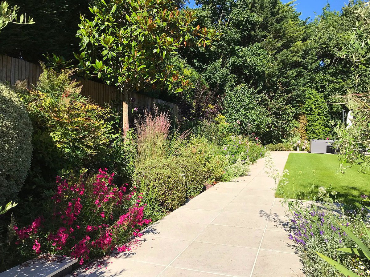 BuyIrrigation's tweet photo. Irrigated ✔️ 
The new planting and lawn in this re-designed garden have been protected by installing an irrigation scheme. https://t.co/aBc13Z2hif