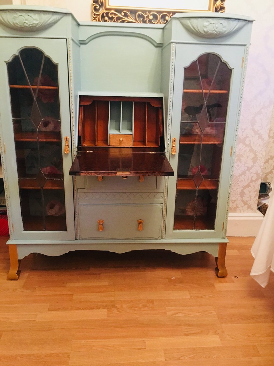 Tag11Gallagher's tweet photo. I just adore this 1940’s side by side display cabinet/bureau. Reloved in mother duck, inlaid with vintage style paper and glammed up with gorgeous gold frensheen to feet handles and locks. 😍#upcycledfurniture #upcycling #vintage for sale 😊  https://t.co/WEWrkPkYxh https://t.co/yeYmoFSWnF