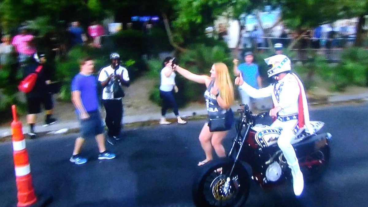 THEWWOMS's tweet photo. @TravisPastrana going down the Vegas streets giving fans selfies and high fives. So cool! #EvelLIVE https://t.co/KufGVvAcWc