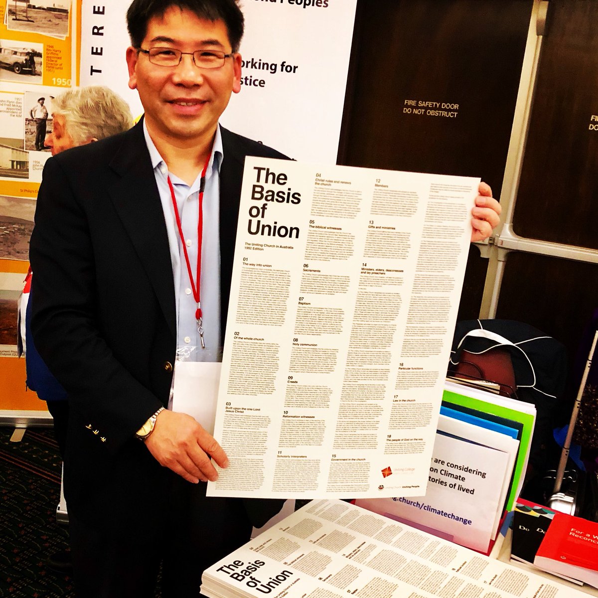 Ji models the FREE Basis of Union posters available from Assembly Resourcing Unit in Lower Hall #UCA18 #AllOfThisIsUs