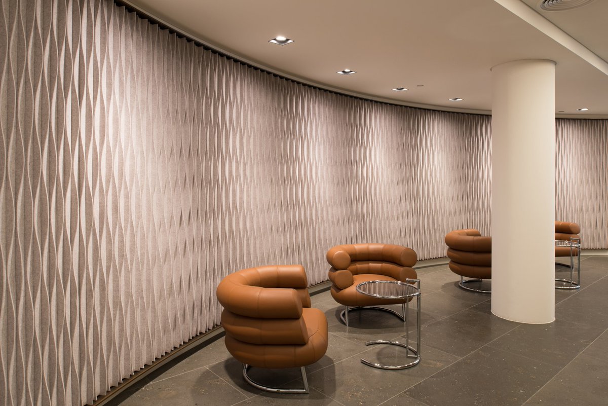 Our striking Laine design on a curved wall within St James reception in central London, UK. #acoustics #wallcoverings #art #wallpanels