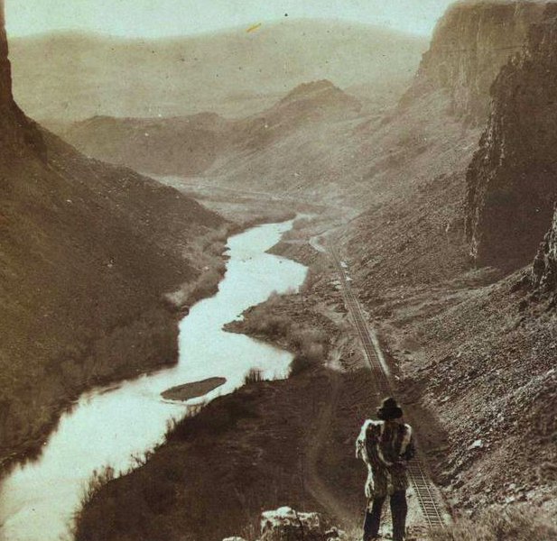 HistoryInPics's tweet photo. A Native American overlooking the newly completed transcontinental railroad, 1868. https://t.co/Y4TxlQ8ji3