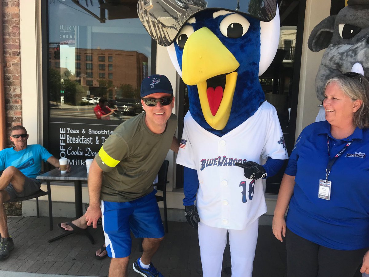 mopicer's tweet photo. Allen photobombing a Blue Wahoos shoot outside Bodacious Cafe. https://t.co/8bK8ZRbsjn