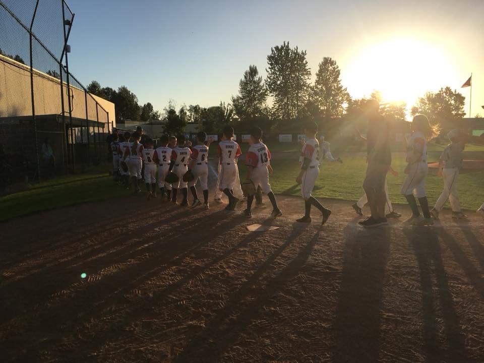 novanewcomer's tweet photo. @PDXDiamondProj Post-game respect between teams at home plate in the setting sun. #district1 #littleleague #npll https://t.co/oGuFhKvXYc